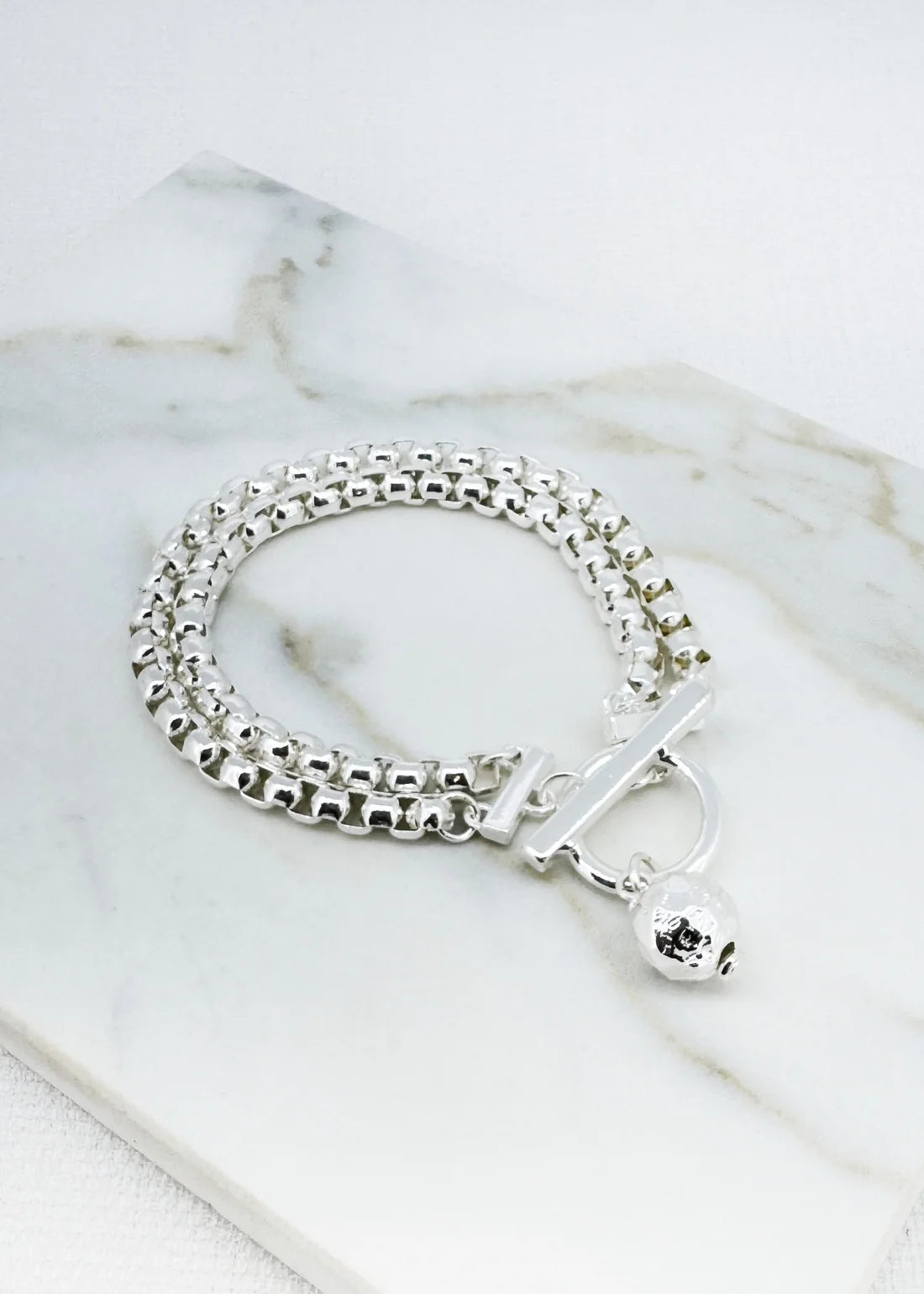 Envy Double layered silver chain bracelet with T-bar and ball charm