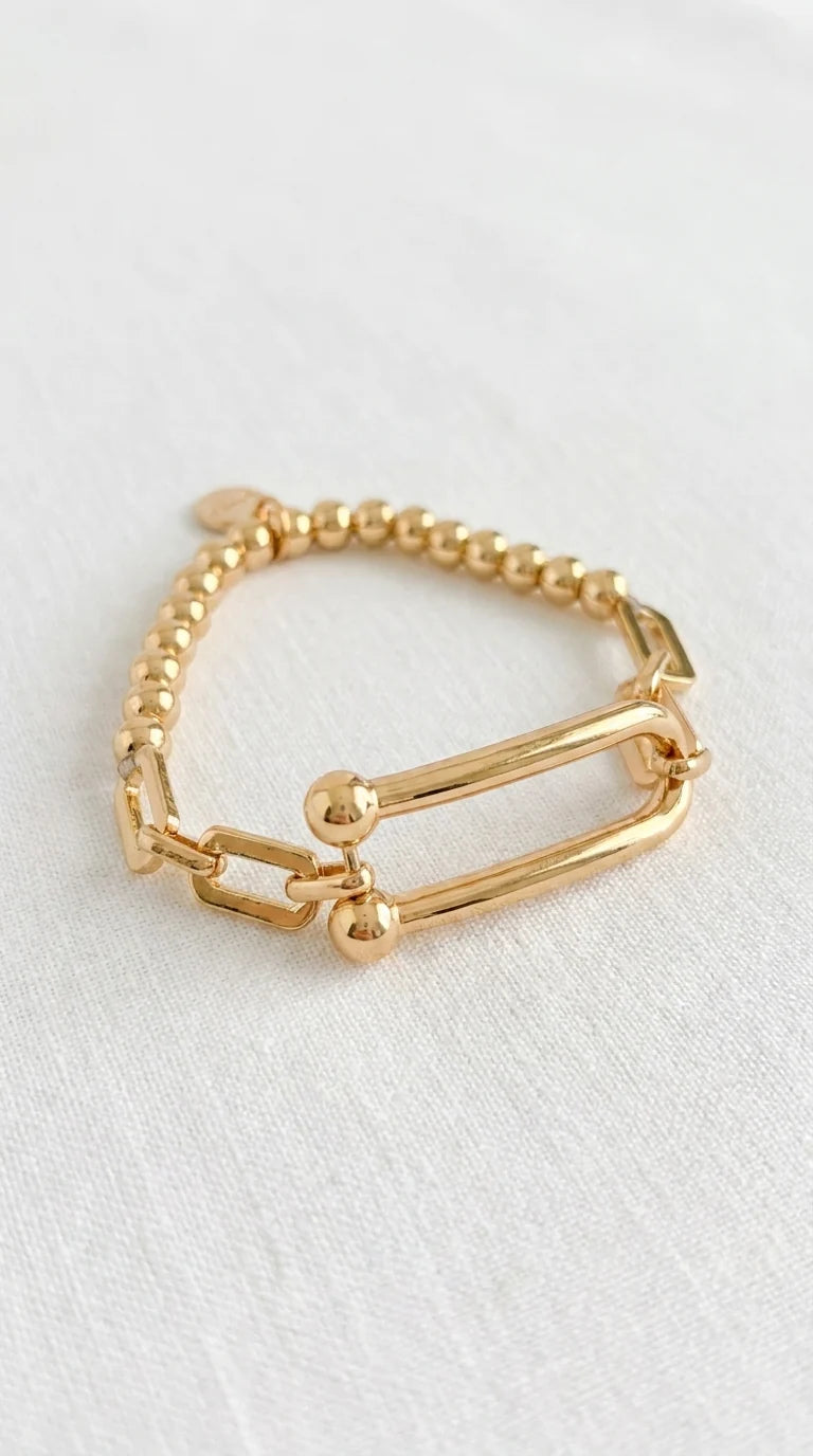 Envy Gold beaded elasticated bracelet with bar design