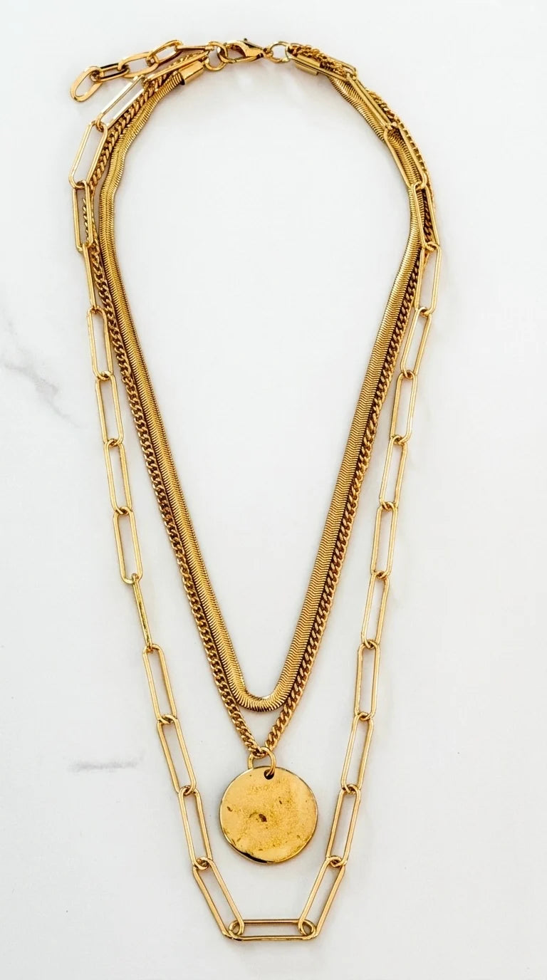Envy Short Gold triple layered necklace with a battered circle pendant