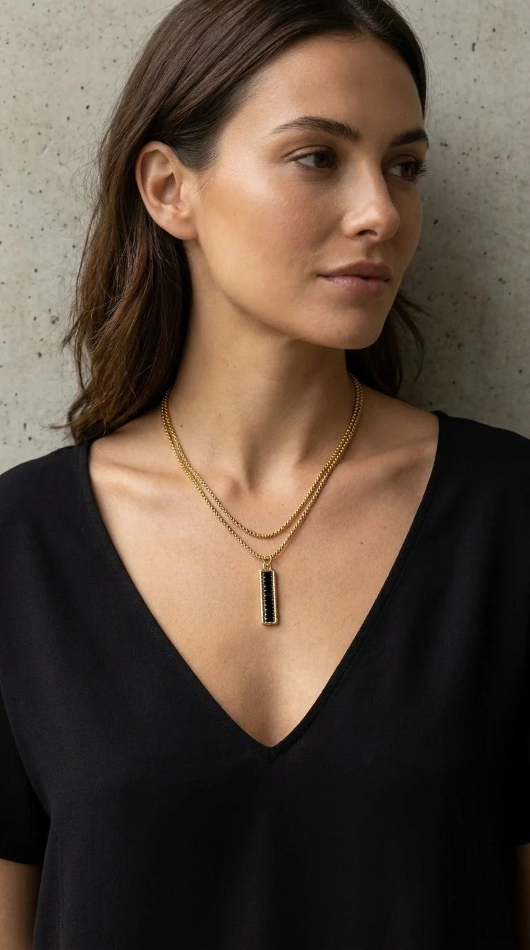 Envy Short gold double layered necklace with gold and black bar pendant