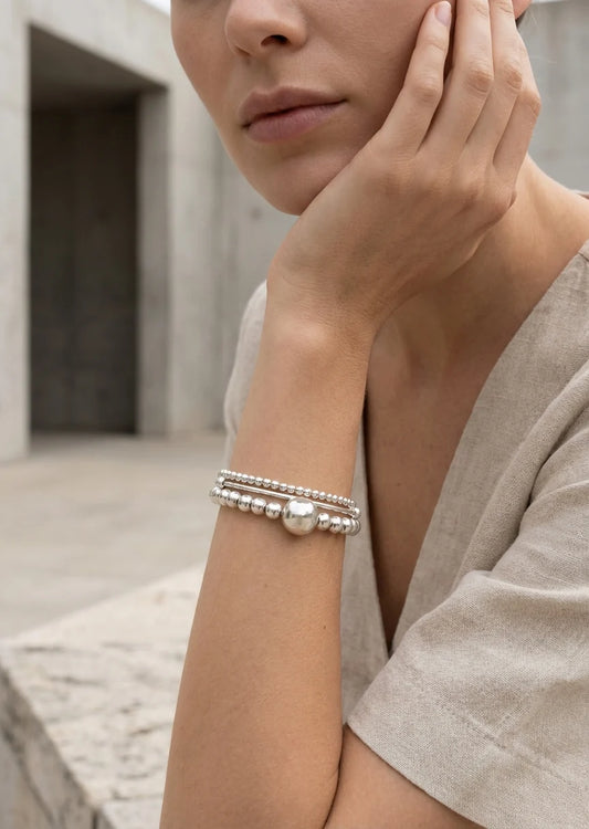 Envy Silver triple layer stretch bracelet with large ball design