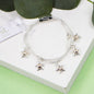 Triple strand magnetic bracelet with little star inlay charms: RG-S