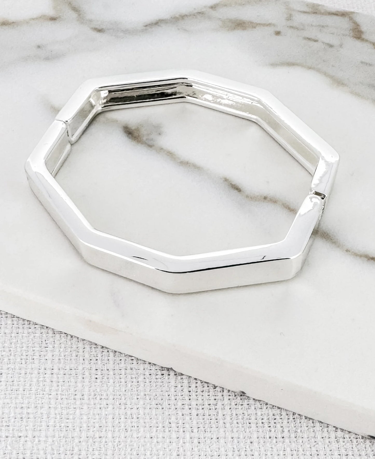 Envy Silver hinged hexagonal bangle