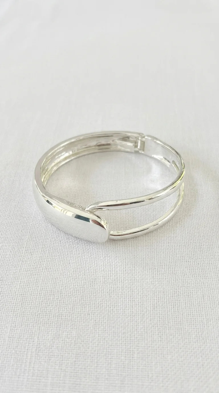 Envy Silver looped hinged bangle