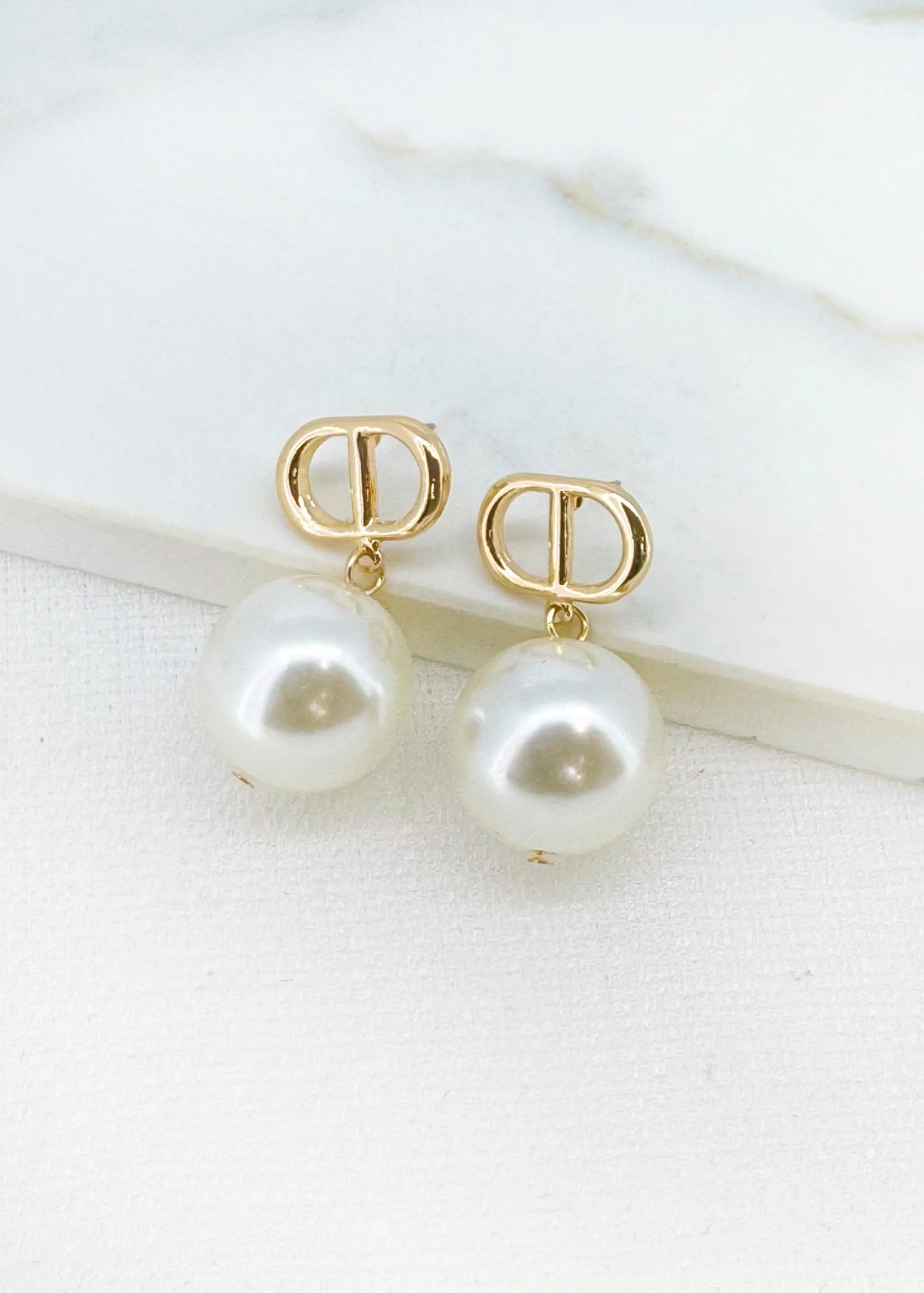 Envy Gold and large pearl drop earring
