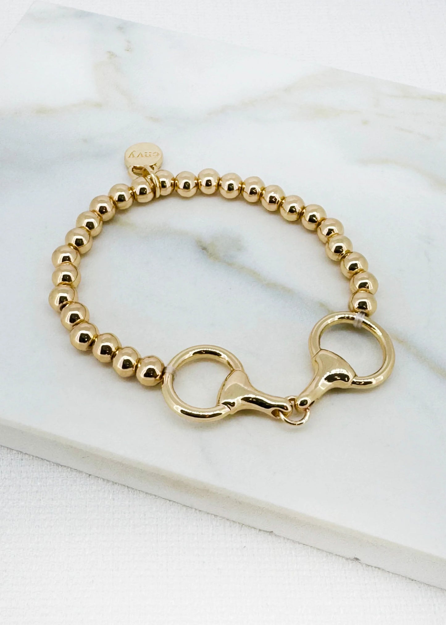 Envy Gold beaded elasticated bracelet with horse bit design