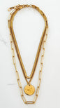 Envy Short Gold triple layered necklace with a battered circle pendant