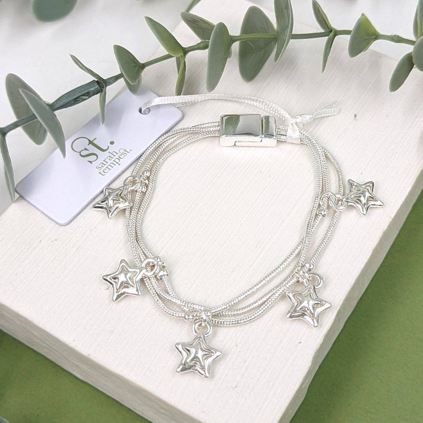 Triple strand magnetic bracelet with little star inlay charms: RG-S