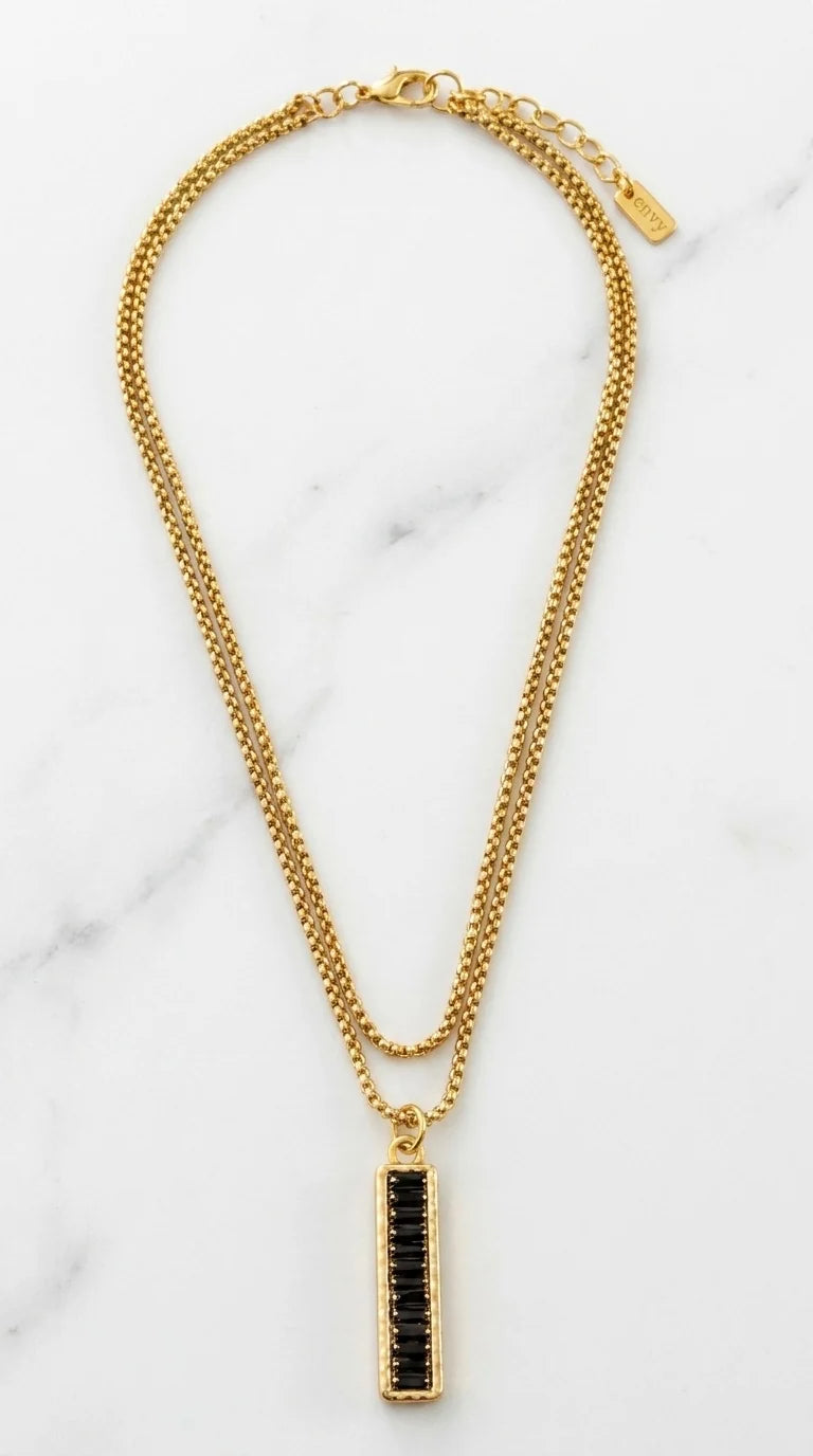 Envy Short gold double layered necklace with gold and black bar pendant