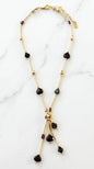 Envy Short gold bar and ball chain necklace with plum and smoked grey tassel detail