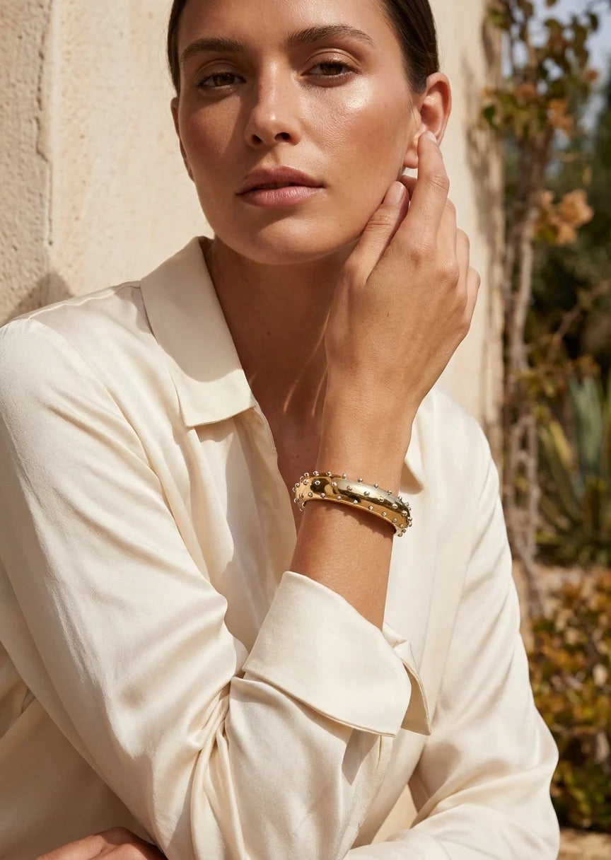 Envy Wide gold and silver two tone stud hinged bangle