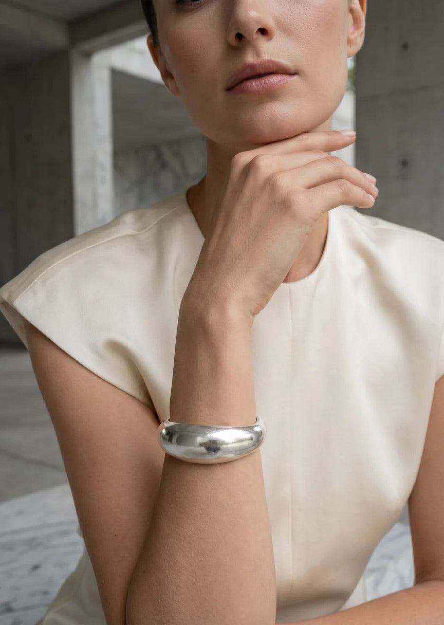 Envy Worn silver wide hinged bangle