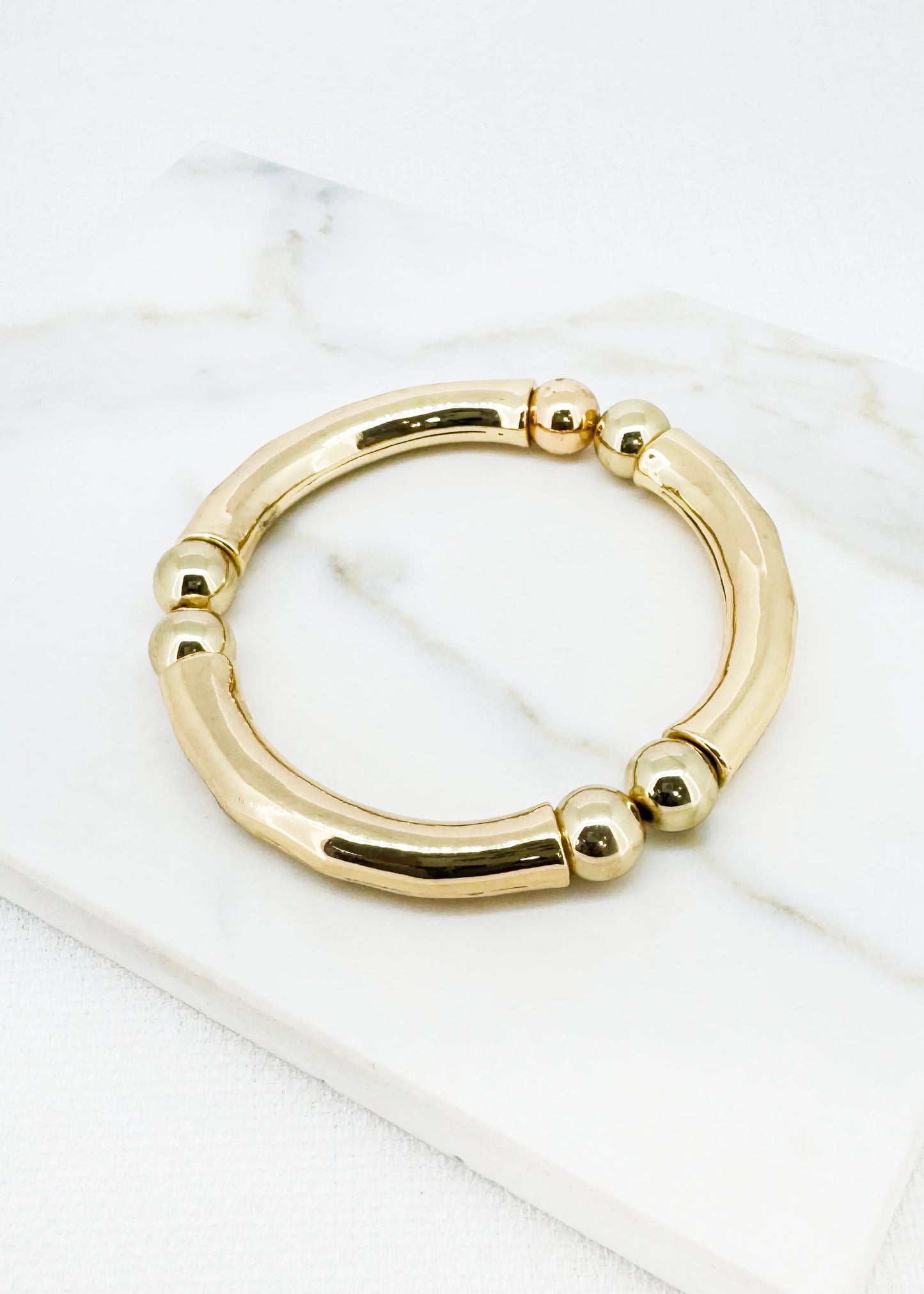 Envy Gold stretch bar and ball bangle