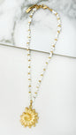 Envy Short gold and white bead design necklace with fossil pendant