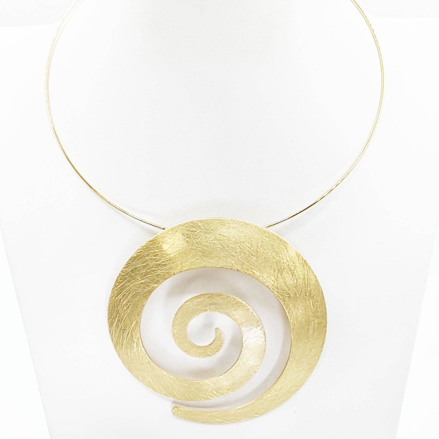 Statement large swirl pendant on torque necklace: G