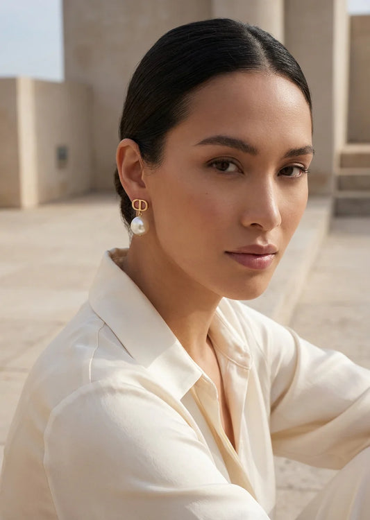Envy Gold and large pearl drop earring